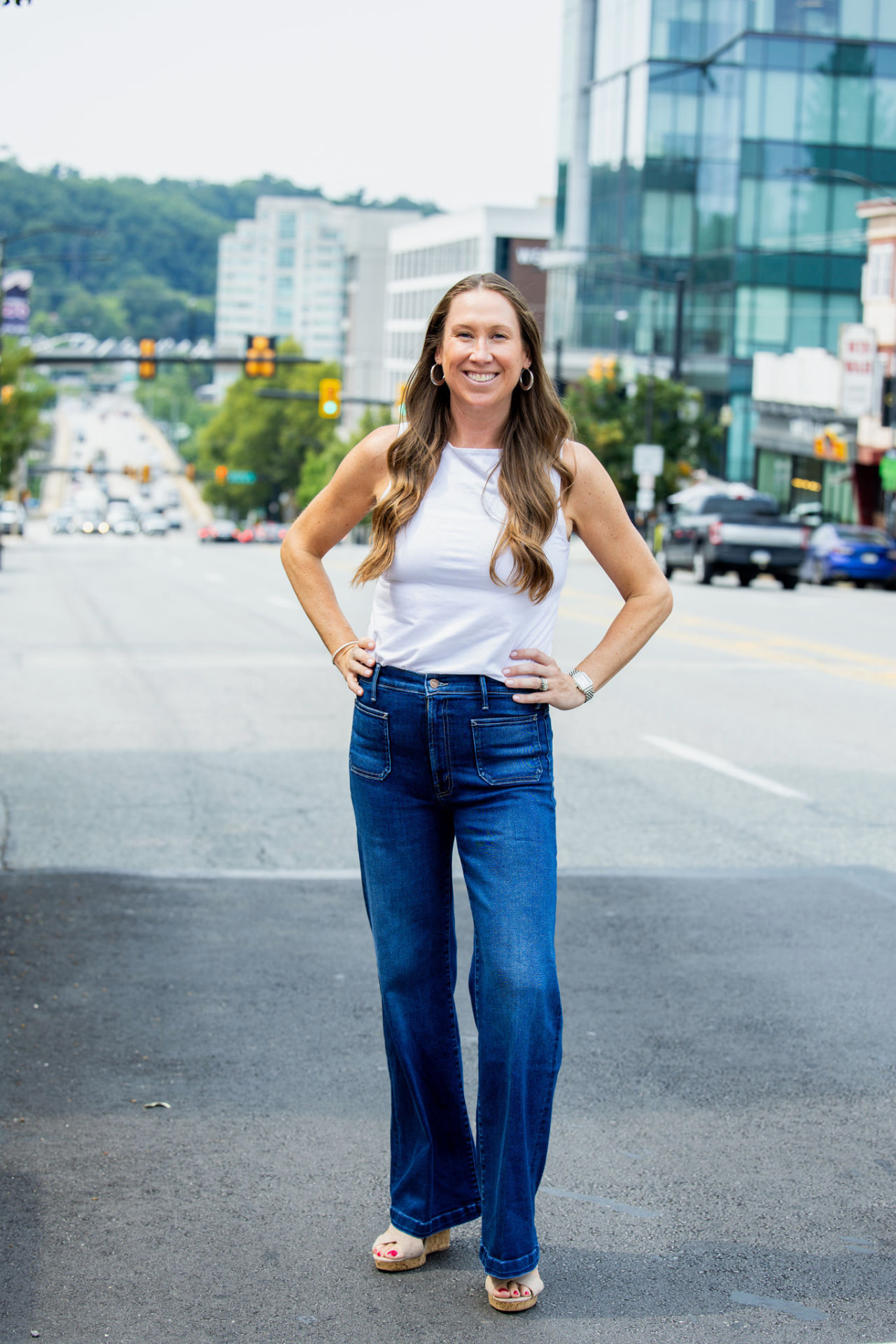 Mackenzie Straub-Wallace standing on a main street in the Greater Philadelphia area